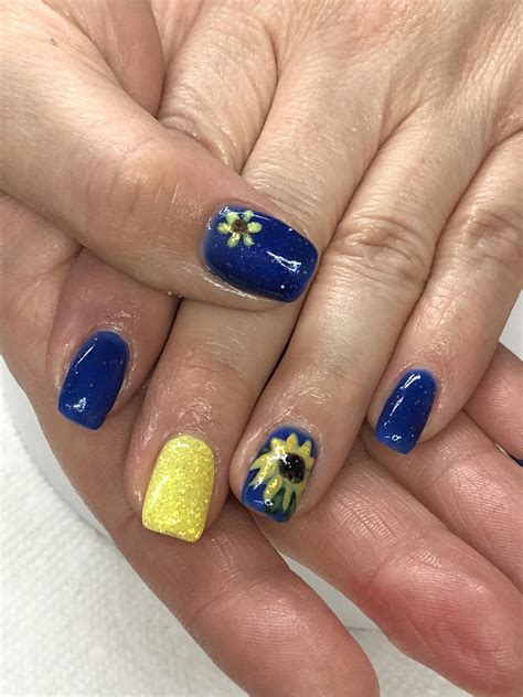 #sunflowernails | Royal blue nails, Glitter gel nails, Sunflower nails