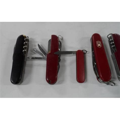 Five Swiss Army pen knives (5)