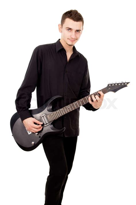 handsome guy plays the electric guitar | Stock image | Colourbox