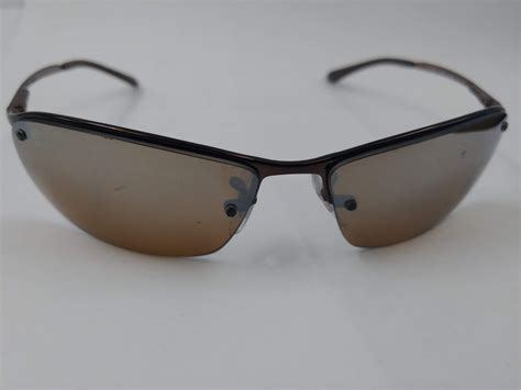 PAIR OF AUTHENTIC POLARIZED RAY-BAN SUNGLASSES (RB3183) - Able Auctions