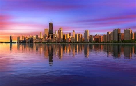 Premium Photo | Colorful sunset above chicago skyline across lake michigan