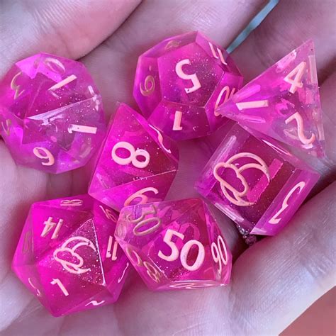 Introducing the Dancing Lights (Pink) Dice Set! This set is translucent ...