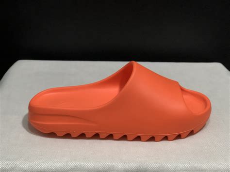 adidas originals Yeezy Slide « Enflame Orange « – TchoukarCorp