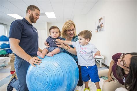 PT student working with baby in pedi lab | Doctor of physical therapy ...