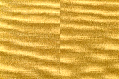 Close-up yellow or golden mustard fabric surface texture for background ...