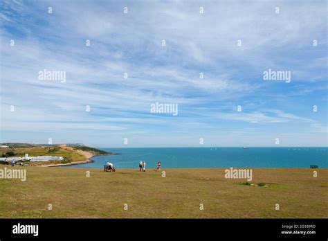 A view across Weymouth Bay to the Jurassic coast from a hill above ...