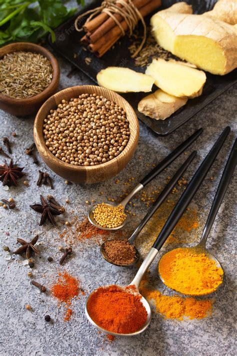 Premium Photo | Various of indian herbs and spices for cooking on a ...