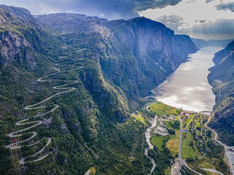 Norway, Rogaland, Lysebotn, Aerial view of winding road and coastal ...