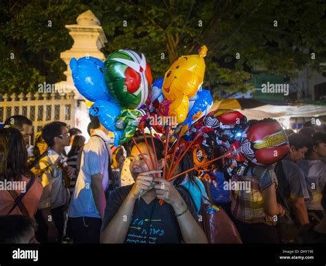 Bangkok, Thailand. 16th Nov, 2013. A vendor sells inflatable toys at ...