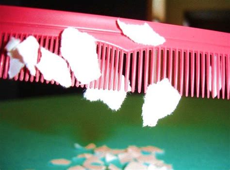 If we comb our hair on a dry day and bring the comb near small pieces ...