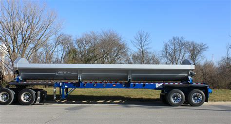 Side-Dump-Trailer-34-foot-Sliver-Tub-Blue-Tandem-Axle-Chassis-side-view ...