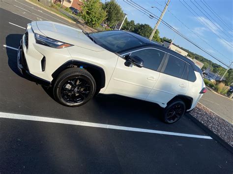 Just got the RAV4 hybrid LSE. Love the way the white and black look ...