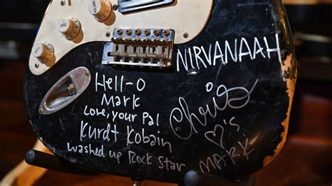 Smashed Kurt Cobain guitar sells for almost £500,000 at auction | World ...