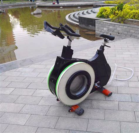 This Exercise Bike Has A Built-In Washing Machine So You Can Cycle Your ...