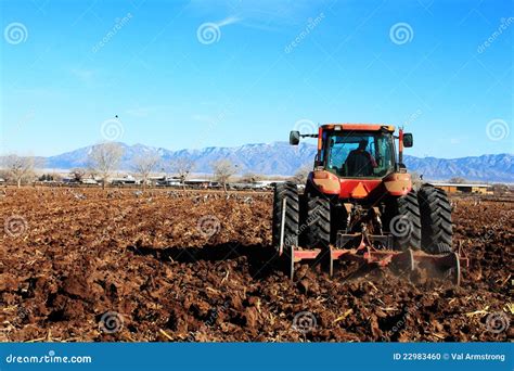 Tractor Plowing Field Stock Photo - Image: 22983460