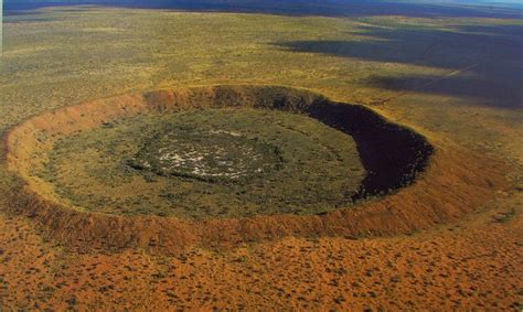 Wolfe Creek Crater is a well-preserved meteorite impact crater in ...