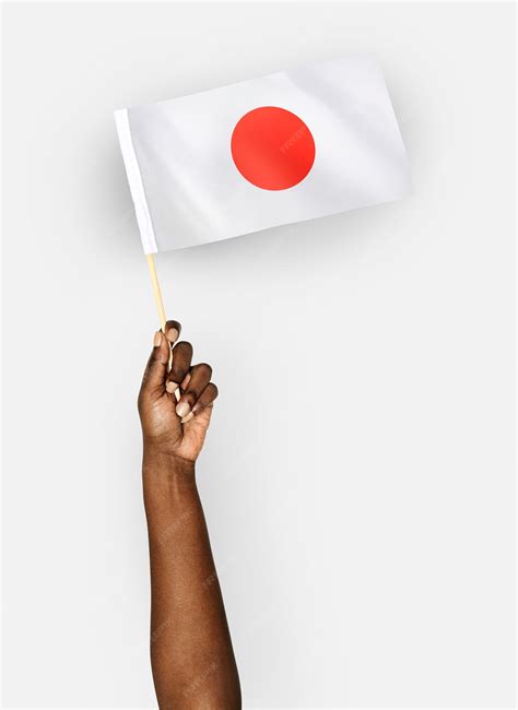 Premium PSD | Person waving the flag of japan