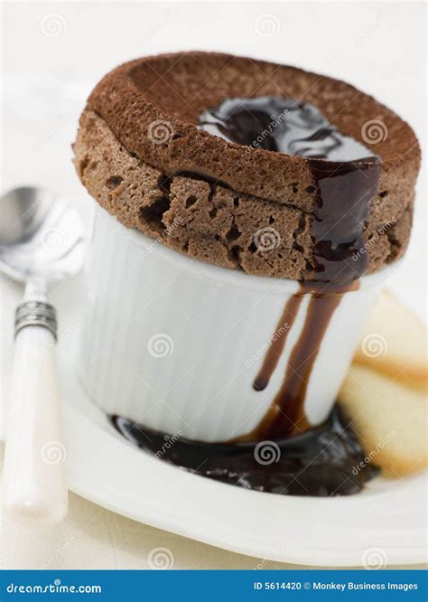 Hot Chocolate Souffle with Chocolate Sauce Stock Photo - Image of ...