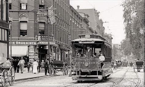 A Trolley on Merrimck Street, passing Centeal Street in downtown Lowell ...