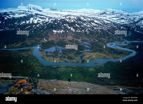 Hiker trekking or backpacking in the Scandinavian Mountains of Sweden ...