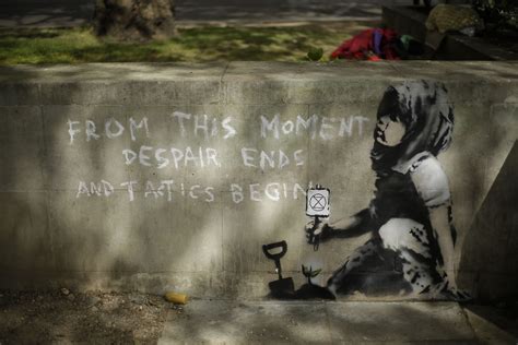 Climate mural emerges after London protests; Is it Banksy?