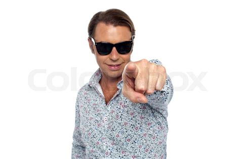 Smart looking man pointing at the camera | Stock image | Colourbox