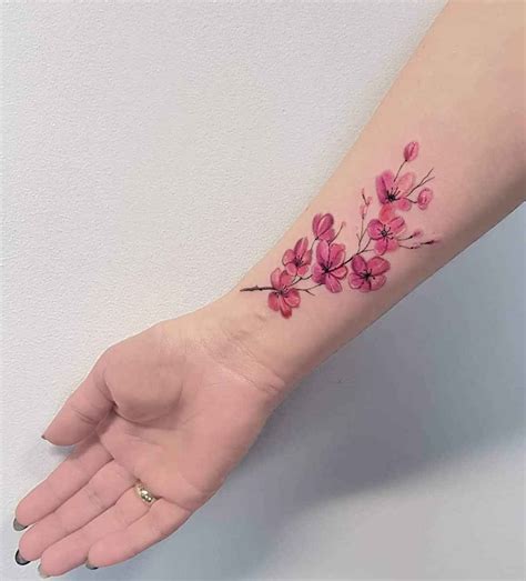 женское тату сакура фото_10 Pink Flower Tattoos, Cherry Tattoos ...