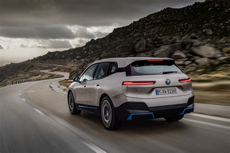 BMW launches its new flagship iX electric SUV with 300 miles of range ...