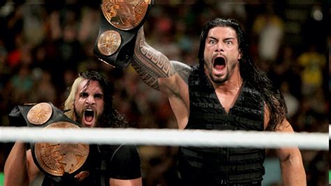 ROMAN REIGNS AND SETH ROLLINS WINS TAG TEAM TITLES! - YouTube