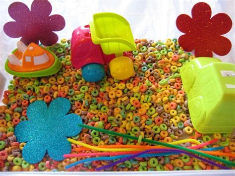 Rainbow Sensory Bin Made with Fruit Loops. Educational, edible sensory ...