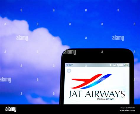 In this photo illustration the JAT Airways Serbian Airlines logo is ...