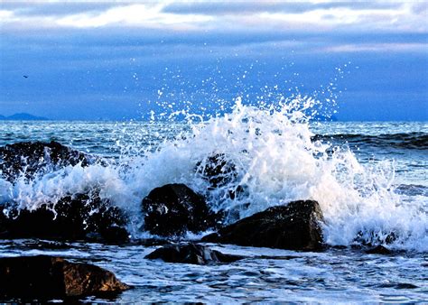 Waves Crashing over Rocks by Hotel Del - Coronado Times