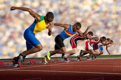 Six athletes starting race - Stock Photo - Dissolve