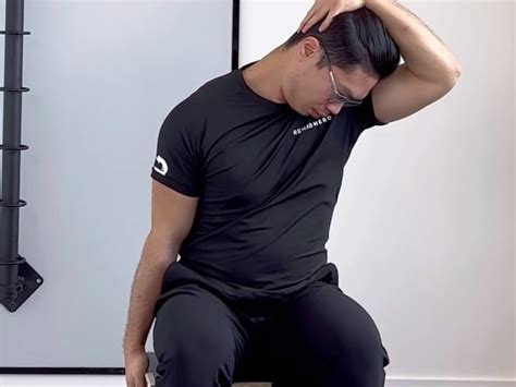 Seated Levator Scapulae Stretch — Rehab Hero