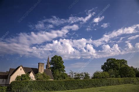 Altocumulus castellanus clouds over a rural scene - Stock Image - C040 ...