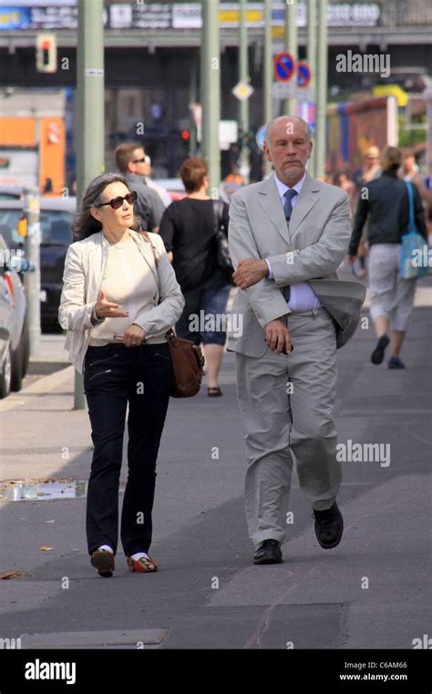 John Malkovich and his family visit the 'Eastside Gallery', the remains ...