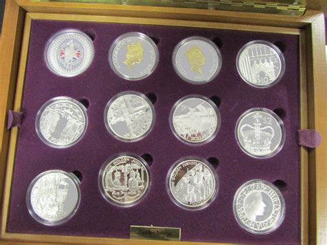 Queen Elizabeth II Golden Jubilee Collection, a 24 coin set of Silver ...