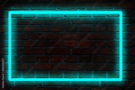 blue neon light on a brick wall at night Stock Photo | Adobe Stock