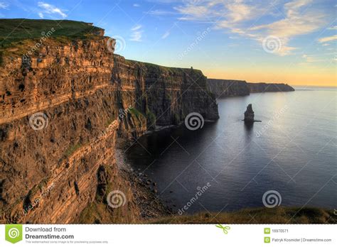 Cliffs of Moher at sunset stock image. Image of cloud - 16970571