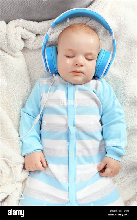 Baby headphones sleeping hi-res stock photography and images - Alamy