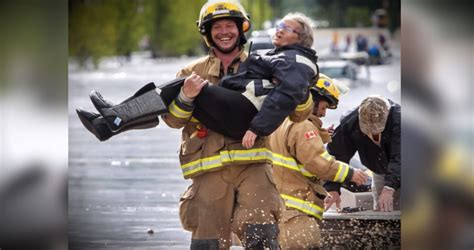 Fireman Saving A Picture Of The Day