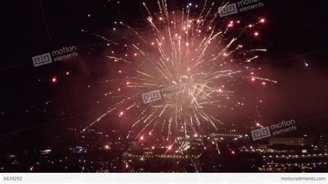 AERIAL SLOW MOTION: Fireworks Above The City Stock video footage | 6639292