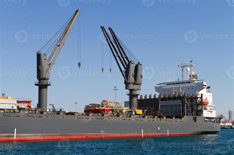 Cargo Ship in port 11701918 Stock Photo at Vecteezy