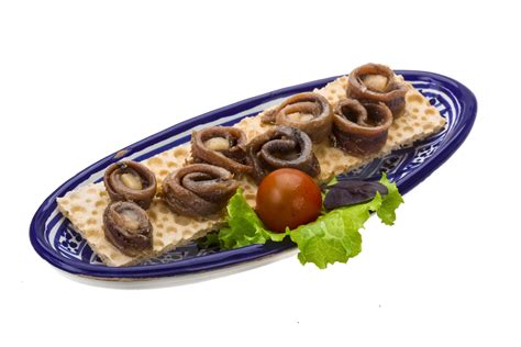 Anchovy snack on white 12887361 Stock Photo at Vecteezy