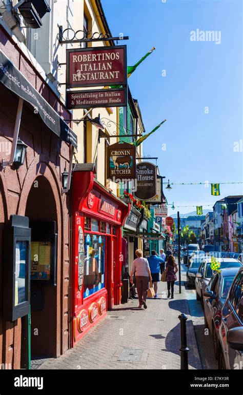 Pubs, shops and restaurants on the High Street, Killarney, County Stock ...