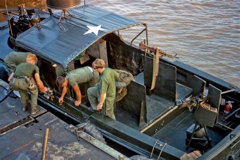 Sailors refuel and prep their MK I PBR at the My Tho Navy docks in this ...