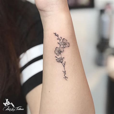 orchid tattoos on wrist - paintingtitleitalicsorquotes