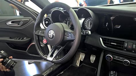 Interior photos of the Alfa Romeo Giulia surfaces; carbon fibre galore ...