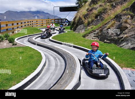 Children riding the luge track, The Skyline Gondola and Luge ...