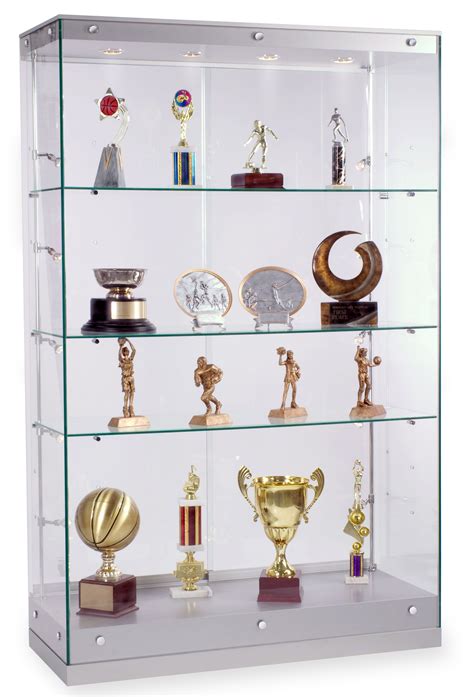 a glass display case filled with lots of trophies